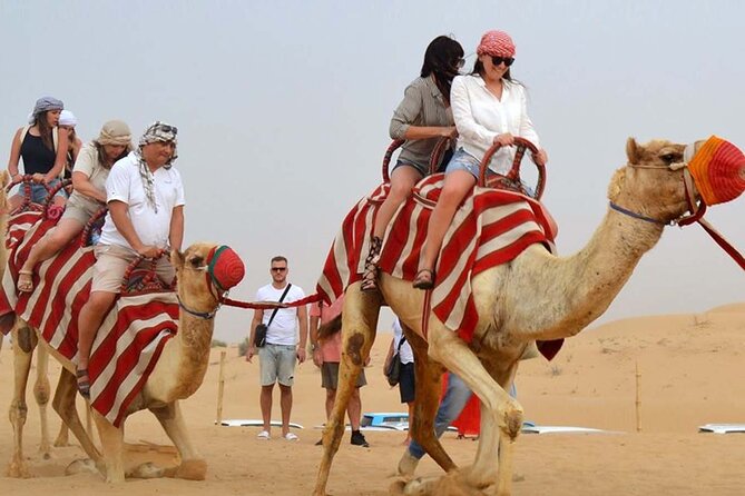 1-Hour Dune Buggy Self Drive with Camel Ride and Sand Boarding in Red Dunes - Desert’s Edge sunrise or sunset stop: the horizon payoff