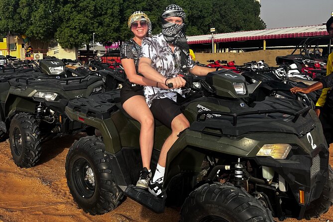 4 Hours Desert Tour with Quad Bike Camel Ride & Sandboard - Quad bike time: 30 minutes of guided driving you actually control