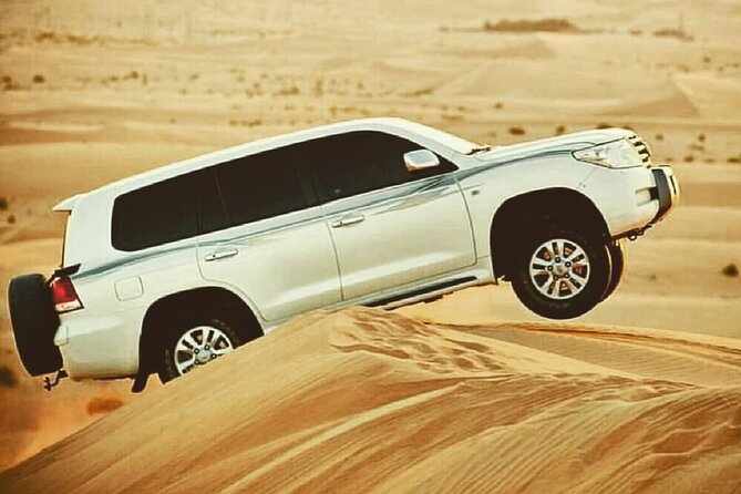 4x4 Desert Safari Dubai with BBQ Dinner & Live Shows - Sunset photos, sand boarding, and the high dune descent