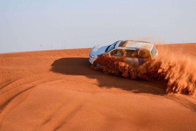6-Hour Dubai Desert Safari with BBQ Dinner & Quad Biking - Quad Biking and Camel Riding: The Hands-On Mix
