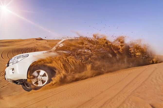 6 Hour Thrilling Desert Safari in 4x4 with Entertainment Show - Stop 1 to Stop 2 at Al Faqa: toilets, mosque time, and your first photo moments