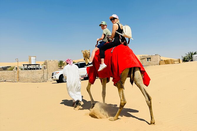 Abu Dhabi: 4x4 Desert Safari and Sandboarding. - BBQ Dinner, Belly Dancing, and Desert Extras at Camp