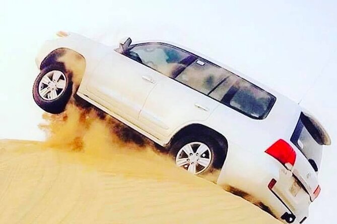 Abu Dhabi: 7-Hours Desert Safari with BBQ, Camel Ride & Sandboarding - Sunset watching and desert photos, your best window for “wow”