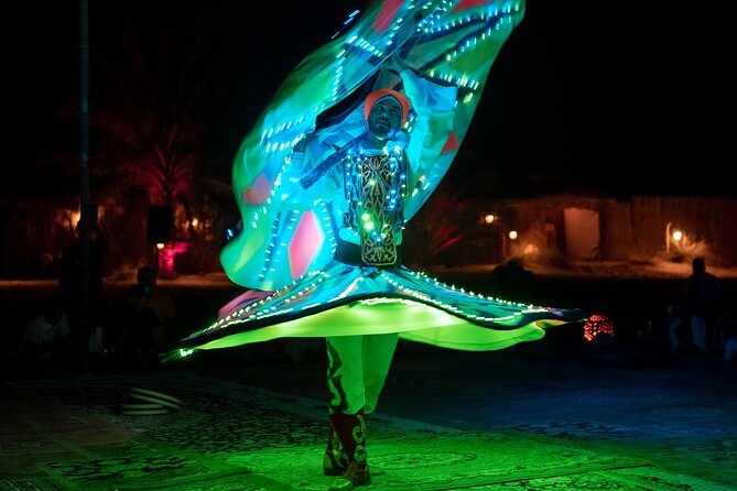 Abu Dhabi: 7-Hours Desert Safari with BBQ, Camel Ride & Sandboarding - Bedouin camp comforts, henna, sheesha, and the live show rhythm
