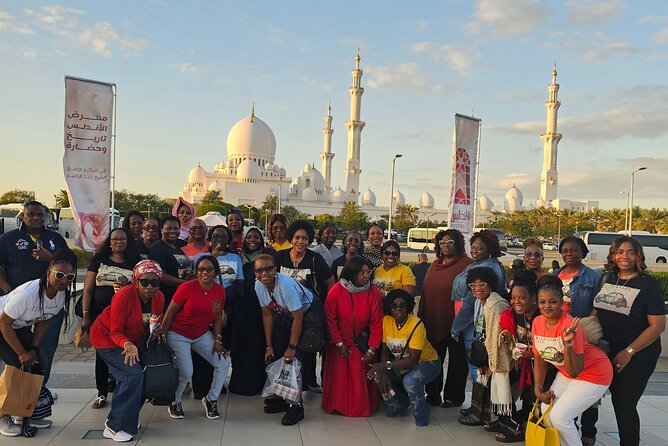 Abu Dhabi City Tour with Ferrari World Tickets - Photo stop plus waterfront design: Etihad Towers by the Corniche
