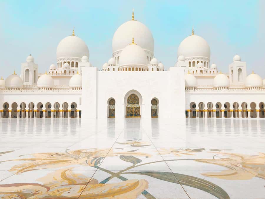 Abu Dhabi City Tour with Qasr Al Watan - Sheikh Zayed Grand Mosque: guided white marble calm