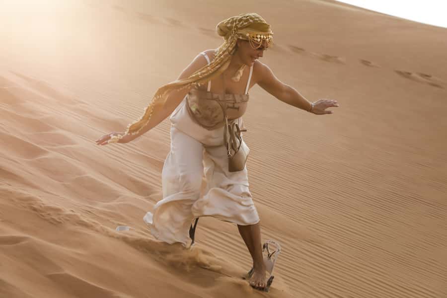 Abu Dhabi: Desert Safari with BBQ, Camel Ride & Sandboarding - Henna, Shisha, and Traditional Costumes