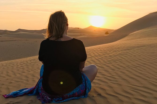 Abu Dhabi Desert safari with BBQ Dinner,Sandboarding & Camel ride - Land Cruiser pickup and dune bashing with a desert marshal