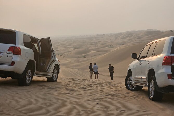 Abu Dhabi Desert Safari With Live Shows And BBQ Buffet Dinner - Camel Ride, Sandboarding, Henna, and Shisha in One Evening