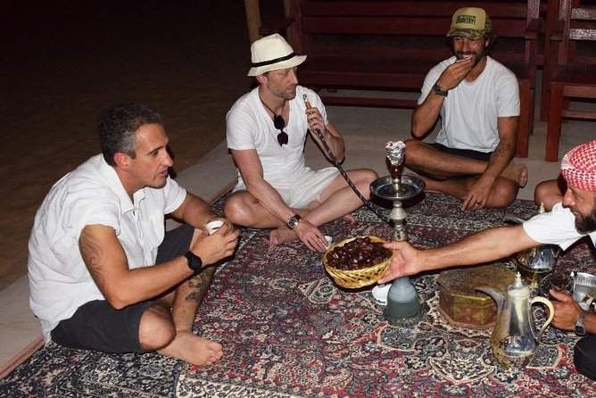 Abu Dhabi Evening Desert Safari with BBQ Dinner and all Camp Activities - The torchlit camp, BBQ dinner, and the evening rhythm