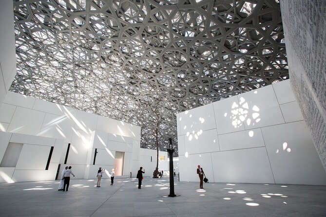 Abu Dhabi Grand Mosque Tour and Louvre Museum Visit from Dubai - Louvre Abu Dhabi and the Rain of Light moment