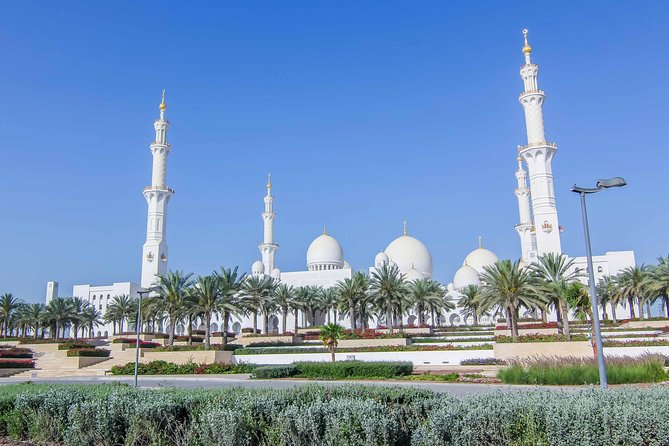 Abu Dhabi Half-Day City Highlights Tour from Abu Dhabi - Sheikh Zayed Grand Mosque: dress code, timing, and what to notice