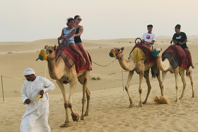 Abu Dhabi Morning Desert Safari,Dune Bashing,Sandboarding,Camel Riding&Quad Bike - Photos, guidance, and the human touch that makes it better