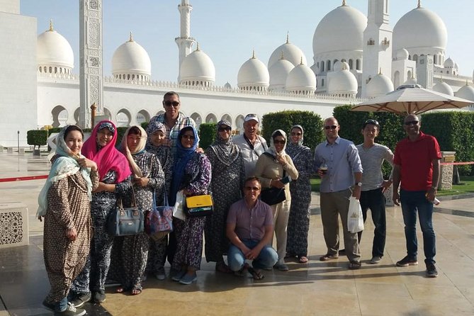 Abu Dhabi tour from Dubai small group with guide, Grand Mosque - Yas Island Photo Stops: F1 Circuit, Ferrari World Exteriors, and Saadiyat Views