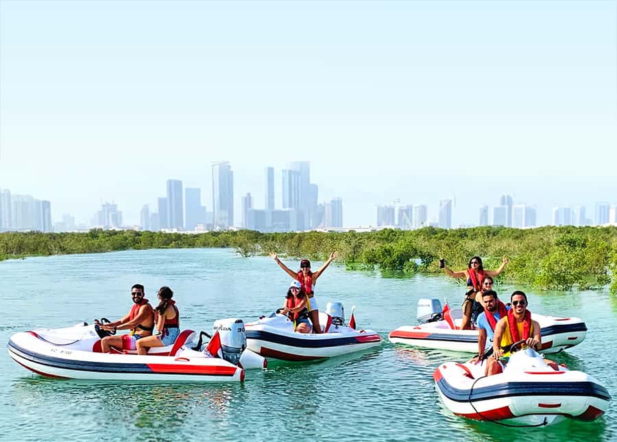 Abu Dhabi: Yas Island Self-Driving Guided Speedboat Tour - Passing Yas Island icons: The Giant Statue, Aldar Headquarters, and more