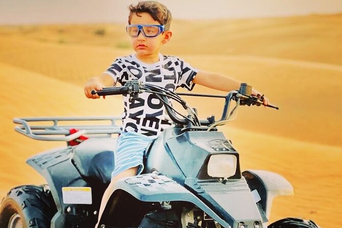 Afternoon Desert Safari with Quad Bike, Camel Ride and Sandboarding - Camel ride and sunset moments, short but classic