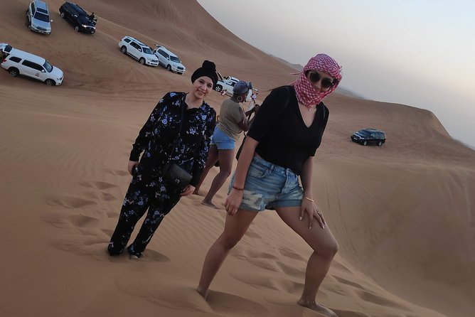 Afternoon Dune Drive Safari with SunSet Photo & Sand Boarding - Al Madam Mid-Desert: Extreme Turns, Camels, and Real Sandboarding
