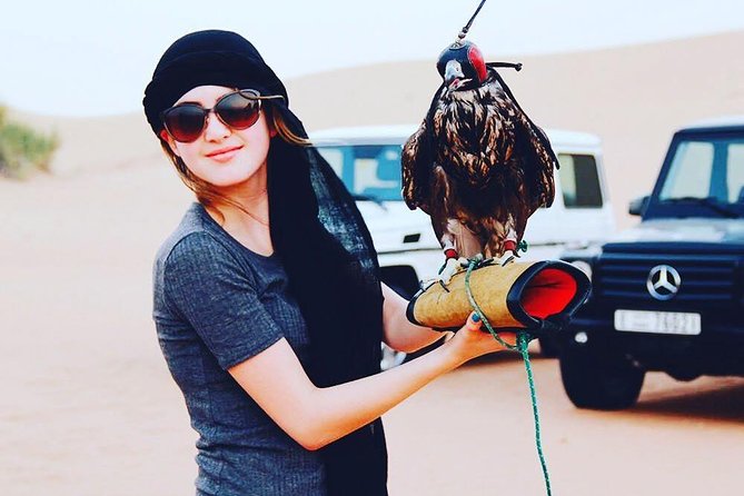 Arabian Desert Safari with BBQ Dinner Camel Ride, Sand Boarding - Inside the Bedouin-style campsite: what the evening feels like