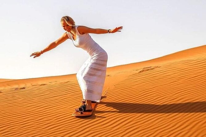 Arabian Desert Safari with BBQ Dinner & Camel Riding - Live entertainment: Tanoura, fire show, then belly dance