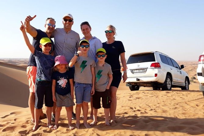 Best Dubai Desert Safari with Buffet Dinner,Sand Boarding & Shows - The Lahbab Red Dunes: Dune Bashing and Included Sandboarding