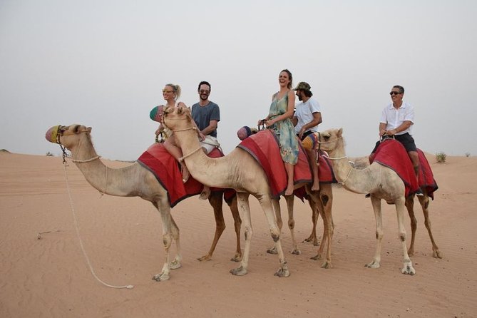 Classic Dubai Desert Safari with BBQ Dinner and Camp activities - Desert camp at sunset: food, henna, and the real reason to stay
