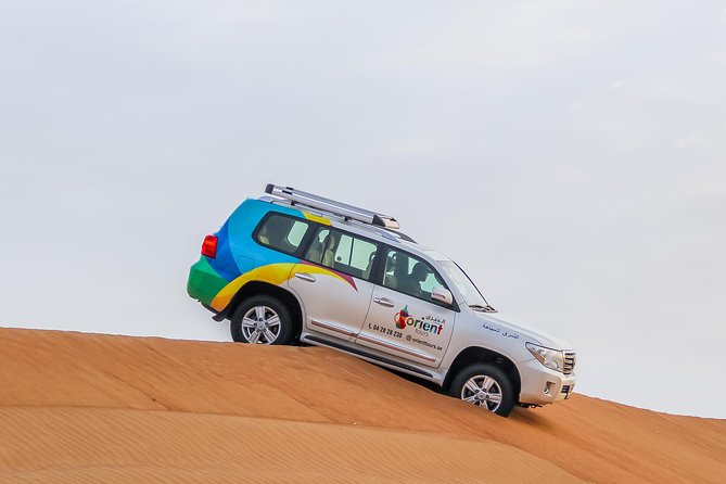 Classic Dubai Desert Safari with BBQ Dinner and Camp activities - Lahbab dune bashing: adrenaline with a safety-first vibe