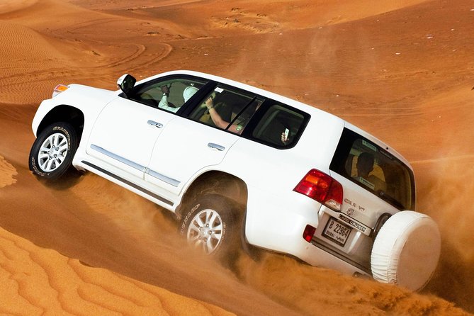 Combo Dubai City Tour and 4X4 Desert Safari with Dinner - The 4x4 desert safari: dune bashing, sandboarding, and camel rides