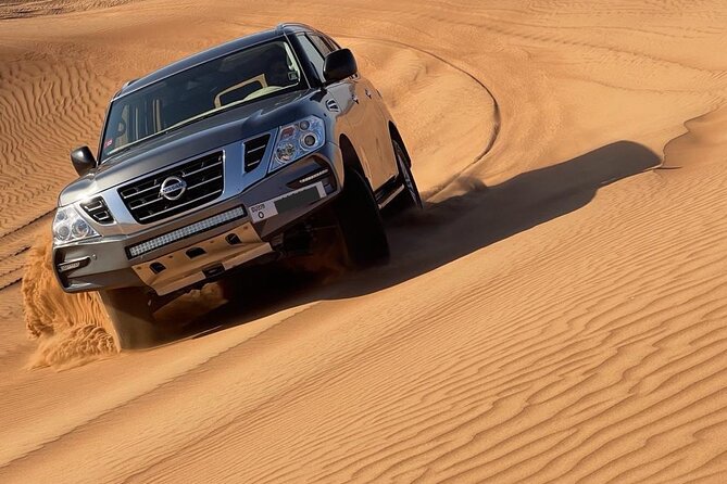 Cultural Desert Safari with dune bashing and BBQ dinner - Grand Sharjah Mosque: your culture warm-up in Sharjah