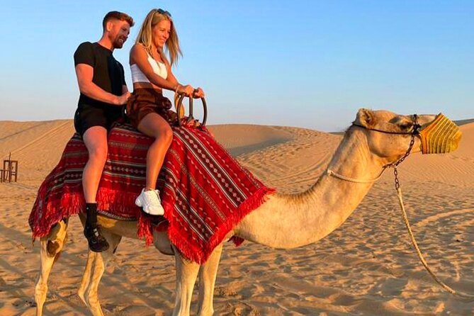 Desert Safari Dubai Tour with Dune Bashing, Camel Ride, & BBQ - From Hotel Pickup to the Desert Refreshments