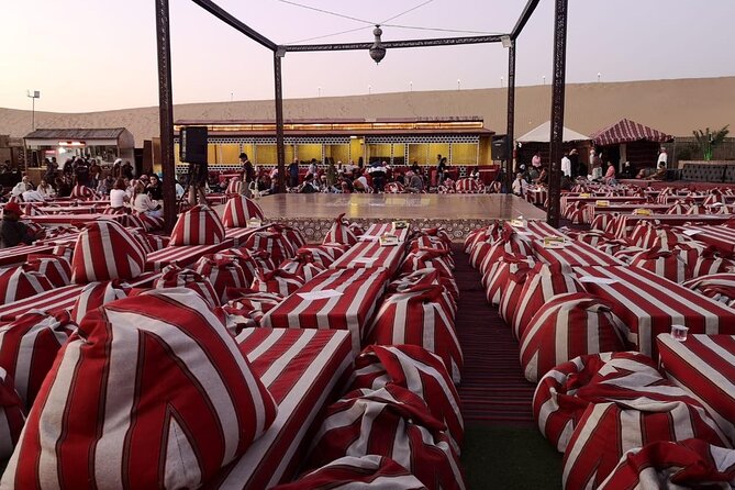 Desert Safari Dubai with BBQ Dinner & Camel Ride - Sandboarding, henna, and shisha at the camp