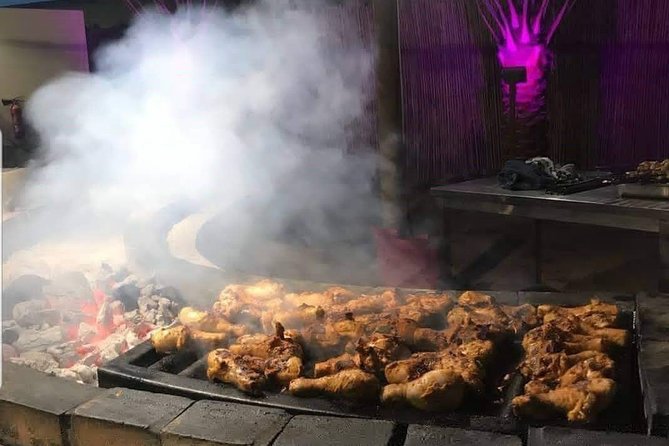 Desert Safari Dubai with Buffet Dinner & 3 live shows - Inside the Bedouin-style camp: camel rides, shisha, henna, falcon time