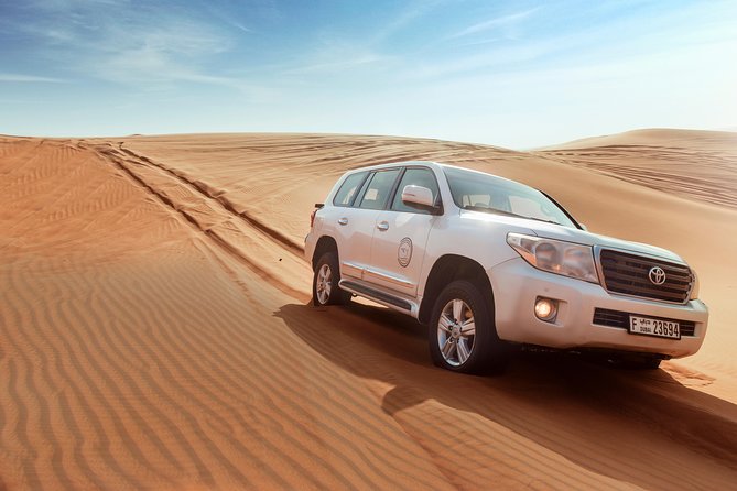 Desert Safari Dubai with Dune Bashing, Sandboarding, Camel Ride, 5 Shows, Dinner - Sunset Photo Window, Then Camel Ride and Sandboarding