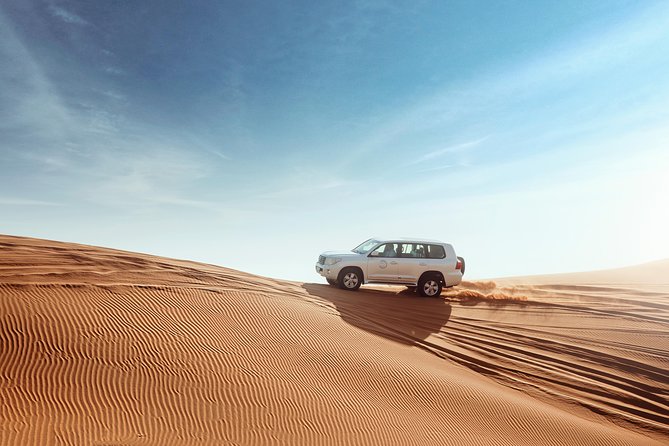 Desert Safari Dubai with Dune Bashing, Sandboarding, Camel Ride, 5 Shows, Dinner - BBQ Dinner and the Live Shows: What You’ll Actually Enjoy