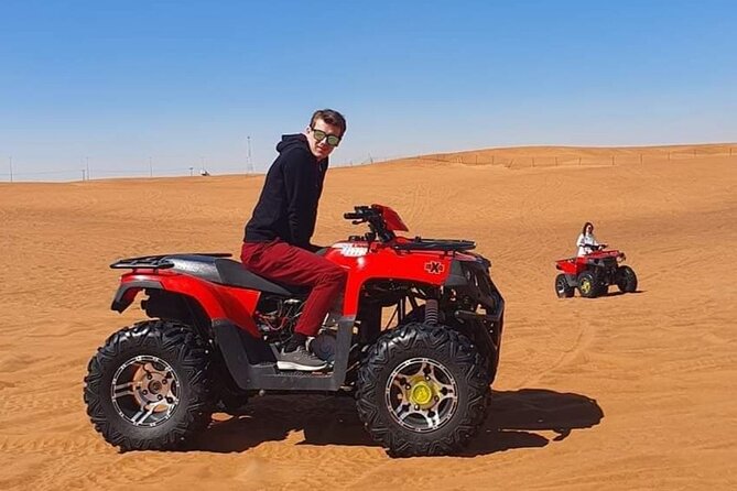 Desert Safari Quad Bike Activity with Dinner in Dubai - Desert camp arrival: welcome tea, camel ride, shisha, henna, and dress photos