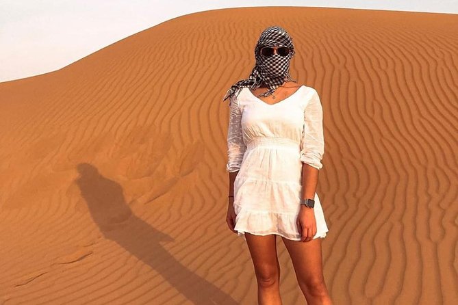 Desert Safari Red Dunes with Camel Ride, Sandboard, BBQ and Shows - BBQ Dinner Buffet with Drinks: What to Expect and How to Enjoy It