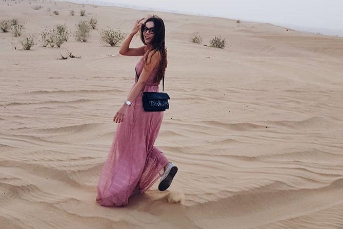 Desert Safari Red Dunes with Camel Ride, Sandboard, BBQ and Shows - Price and Value: Is $46 a Good Deal for This Much Evening?