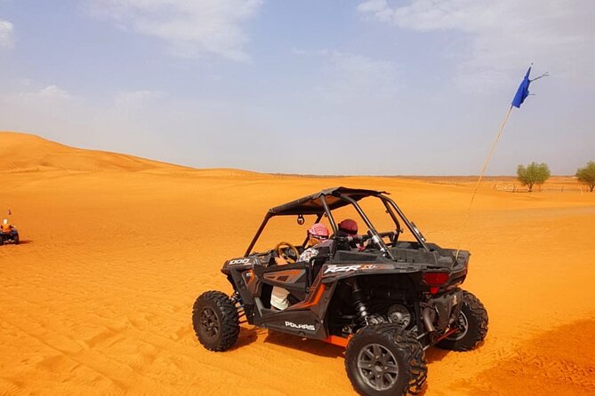 Desert Safari With BBQ Dinner, Quad Bike & Camel Ride from Dubai - Camel Ride, Traditional Attire, and Falcon Moments