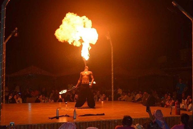 Desert Safari With BBQ Dinner, Quad Ride And And Sand-boarding - The shows: belly dance, Tanoura, and fire performance