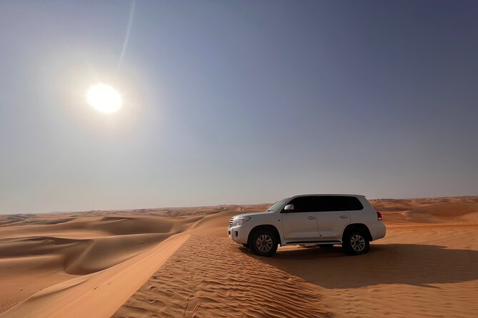 Desert Safari with Dune Bashing and Camel Ride plus Sand Boarding - From Abu Dhabi city to Al Khatim desert: the drive that sets expectations