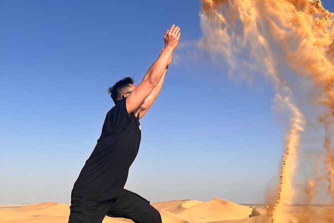 Desert Safari with Dune Bashing and Camel Ride plus Sand Boarding - Bedouin camp arrival: tea, coffee, dates, henna, and falcon photos