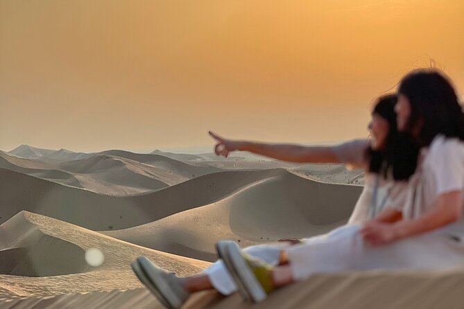 Desert Safari with Dune Bashing and Camel Ride plus Sand Boarding - The dune bashing sequence: camel farm, sand riding, and photo-stop timing