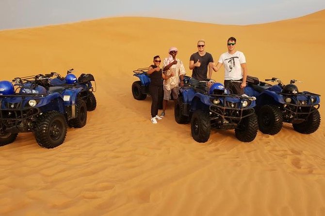 Desert Thrills: Evening Safari with Quad Bike & Camp Activities - Al Awir Desert Camp: Camel Ride, Henna, Falcon, and Traditional Dress