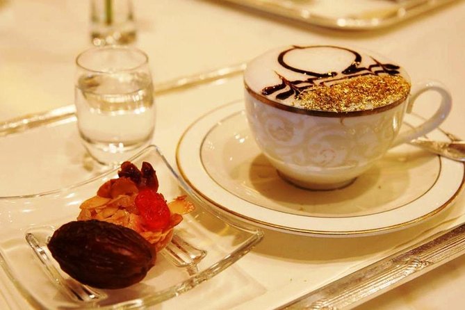 Dining Experience at iconic Emirates Palace Abu Dhabi - Afternoon tea at Episodes: a cool break with tea, pastries, and savory bites