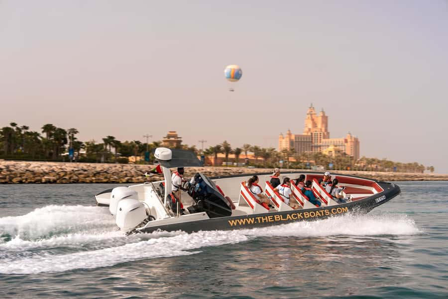Dubai: 100-Min Speed Boat Tour, Atlantis & Burj Al Arab View - Jumeirah Beach Residence and Skydive Dubai, seen from the shoreline