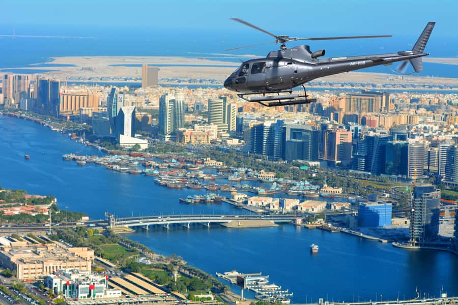 Dubai: 17-Minute Helicopter Tour over Palm Jumeirah - The extra sights: Meydan Racecourse, The World Dubai, Jumeirah Beach, and Port Rashid