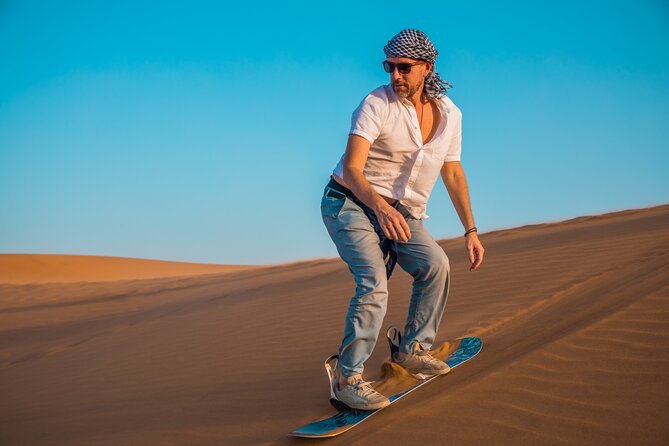 Dubai: Adventure Quad Bike Safari, Camel Ride & Refreshments - Lahbab pickup: air-conditioned comfort and a clear start