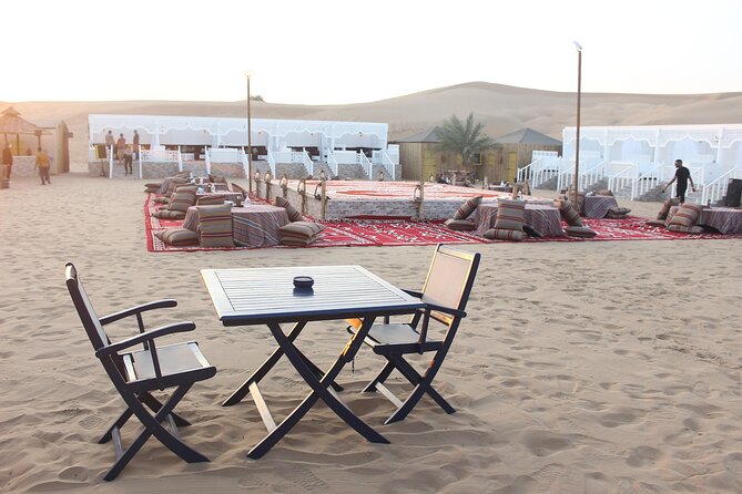 Dubai Afternoon Desert Safari and BBQ Dinner - Camel ride and sand boarding: fun, but manage expectations