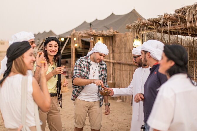 Dubai: Al Marmoom Oasis with Private Bedouin Tent & Dinner - The Bedouin village welcome: qahwa, luqaimat, dates, then camels