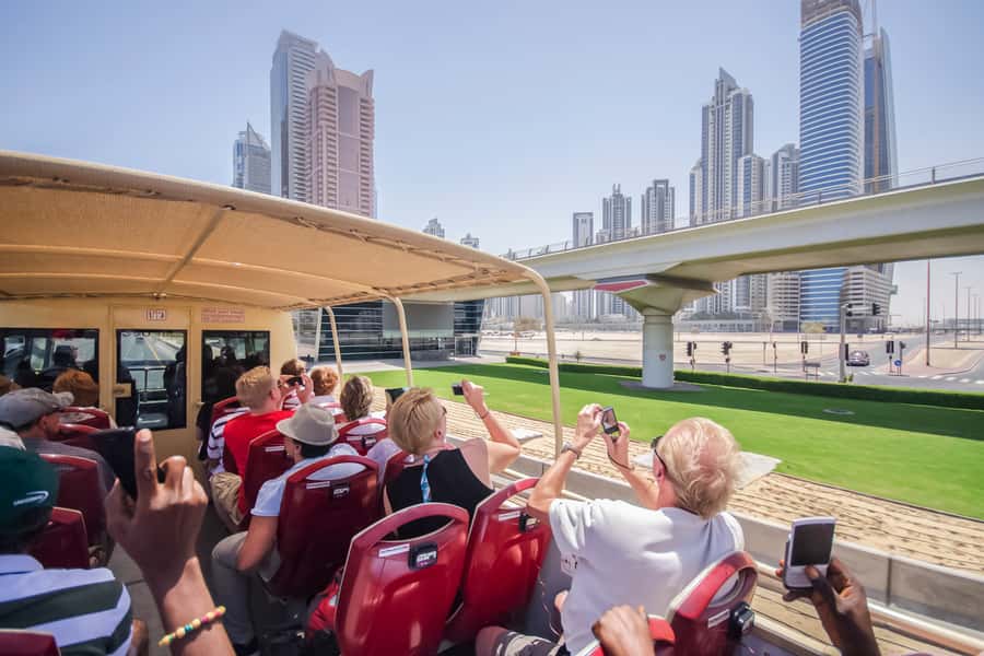 Dubai: Big Bus Hop-On Hop-Off Tour & Optional Dhow Cruise - Practical Tips for Hot Weather, Earphones, and Photo Timing