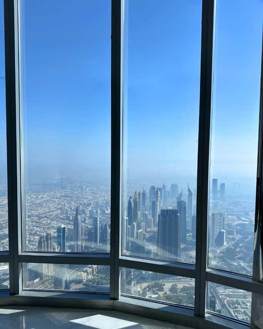 Dubai: Burj Khalifa Level 124, 125 with Dubai Opera Tour - What you do up there: telescopes, exhibits, and 360-degree photo opportunities